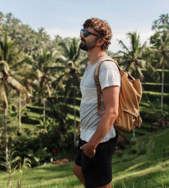 outdoor-portrait-of-handsome-travel-man-with-back-2021-08-31-09-40-54-utc-e1671156185744.jpg